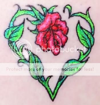 Ronnie at Art With a Pulse Tattoo modified the Heart-Kellie-Rose that he did