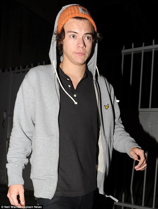 Keeping busy: Harry was seen leaving a recording studio in Camden, London on Tuesday night 