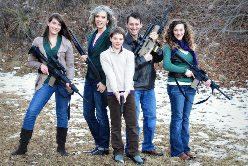 http://bigmedia.org/wp-content/uploads/Greg-Brophy-family-photo-with-daughters-gun-pointed-at-son.jpg