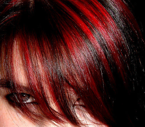 black hair with pink to maroon 