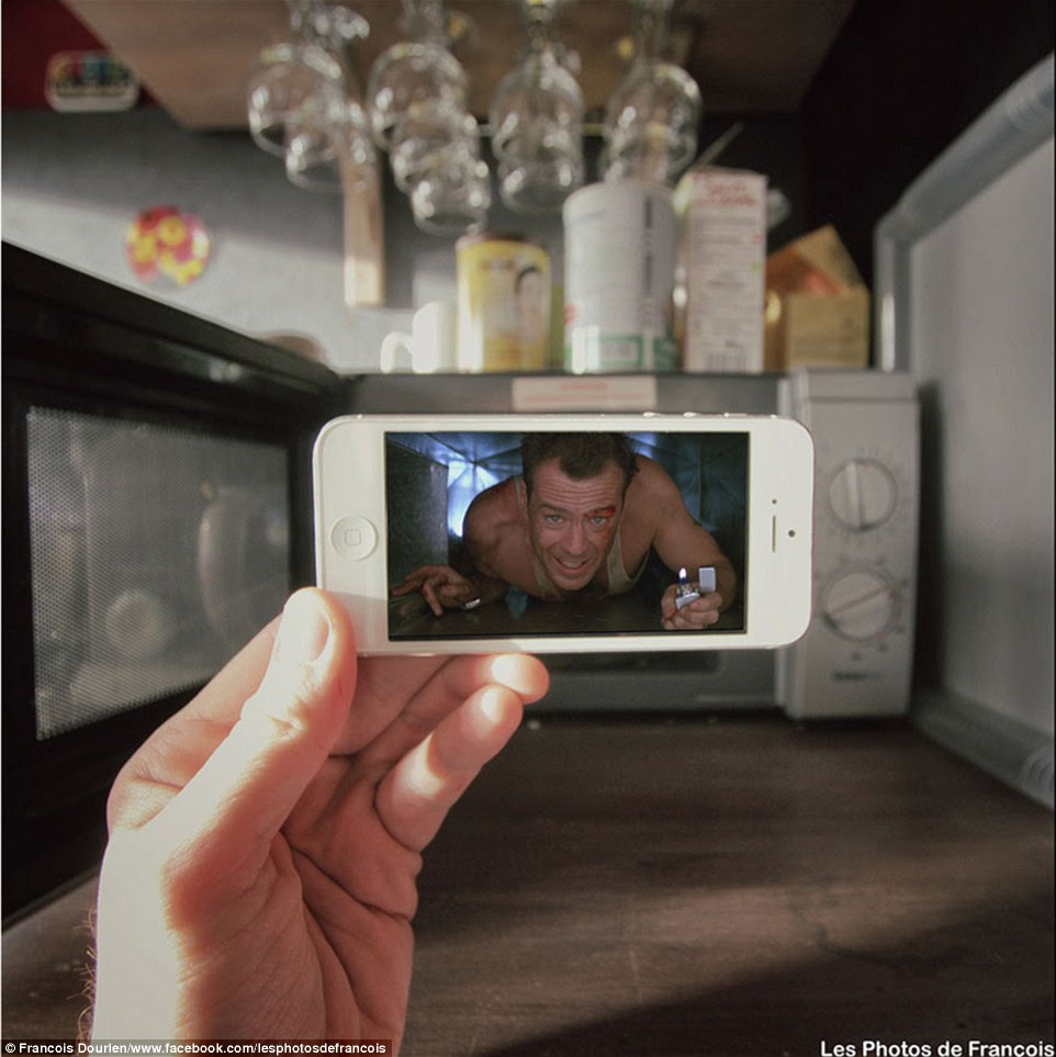 Die Hard: Bruce Willis' on-screen hero John McLean, who is memorably filmed crawling through a lift shaft in the 1980s blockbuster Die Hard, appears to be emerging from a microwave