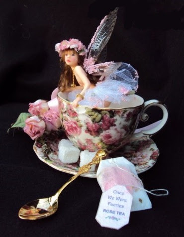 CDHM Gallery of Judy Raley of Once We Were Faeries creates original one of a kind art dolls, including fairies and fairy children, dressed, wigged and ready for display in varying sizes from dollhouse mini size to 10 inches
