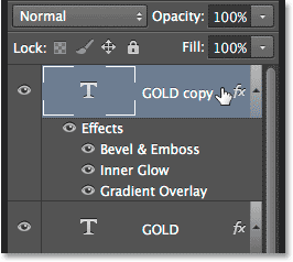 Selecting the top layer in the Layers panel. Image © 2014 Photoshop Essentials.com