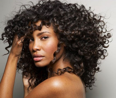 sewn in hair extensions. hair with a sew-in weave.