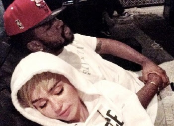 Miley Cyrus with her new beau, Mike will.