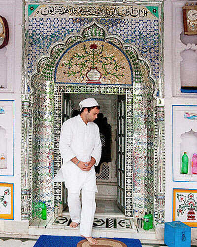 AICC General Secretary Rahul Gandhi visits the shrine of Hazrat Syed Mardan Ali Baba in village Matcha in Hamirpur on Wednesday, October 12, 2011.
