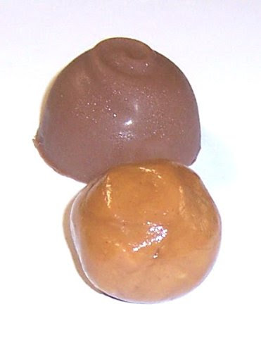 Scott's Cakes Milk Chocolate Peanut Butter Cream Filling Candies with Burgandy Foils in a 8 oz. White Gourmet Box Scott's Cakes Milk Chocolate Peanut Butter Cream Filling Candies with Burgandy Foils in a 8 oz. White Gourmet Box