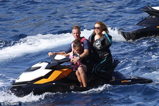 How's my hair? Mariah kept her look relaxed, leaving her long curls loose for the day at sea