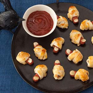Spooky Halloween Menu Ideas Think pigs in a blanket, with a twist! Guests will love eating these baked