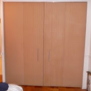 Sliding floor to ceiling doors