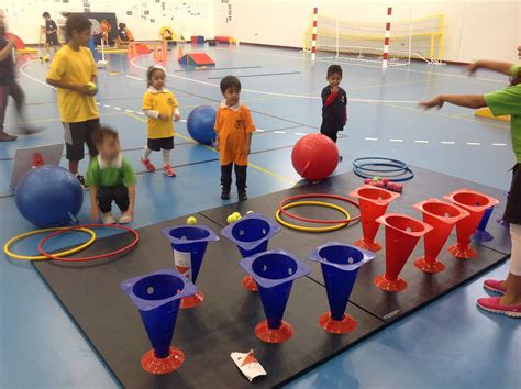Pe curriculum for kindergarten age children with 10 top sport games and activities · pool noodle games for p.e and motor skill learning · hula hoops for kids pe . preschool 3 sports day