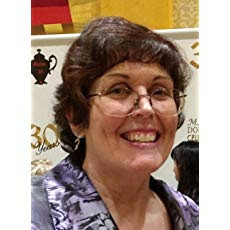Headshot for author Meg Macy.