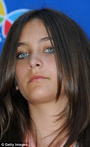 Siblings? Lester remarked of genetic testing to determine whether Harriet, pictured in 2009, and Paris, pictured in 2011, are sisters, 'It is up to them'