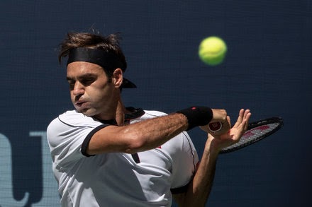 Roger Federer Heats Up on Court and Off