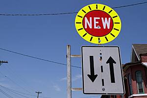 New signage and a new stoplight have been installed on Macnab Street North.