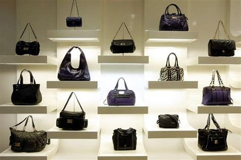 boutique wall handbag display boutique decor ideas