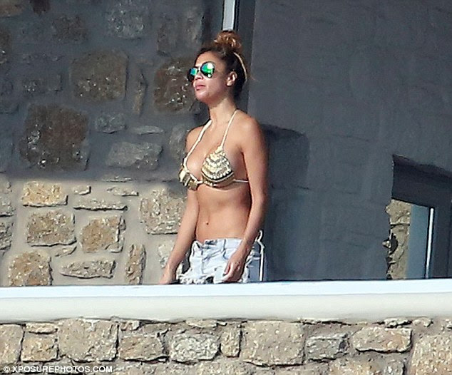 Catching some rays: The star tilted her face up to the sun and basked in its glow 
