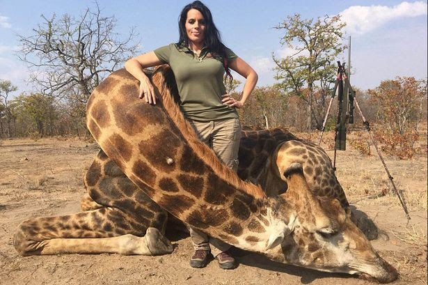 Sabrina Corgatelli with a giraffe