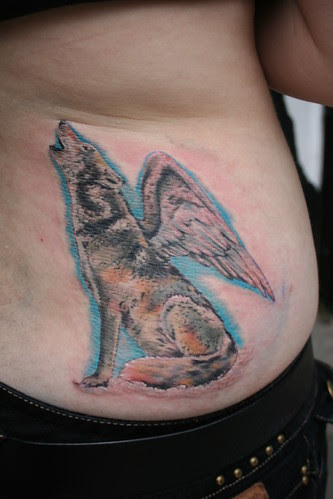  howling wolf with wings tattoo by Mirek vel Stotker 
