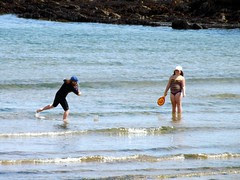 Playing in the sea.