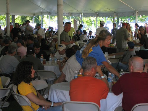 clearing table. Volunteer clearing table. A lot of people ride in the Pan Mass Challenge.