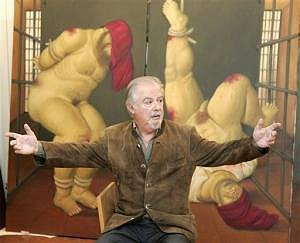 Fernando Botero in front of one of the Abu Ghraib paintings