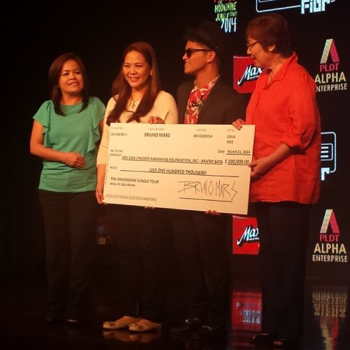Image result for bruno mars donated $100,000 to victims of Typhoon Yolanda