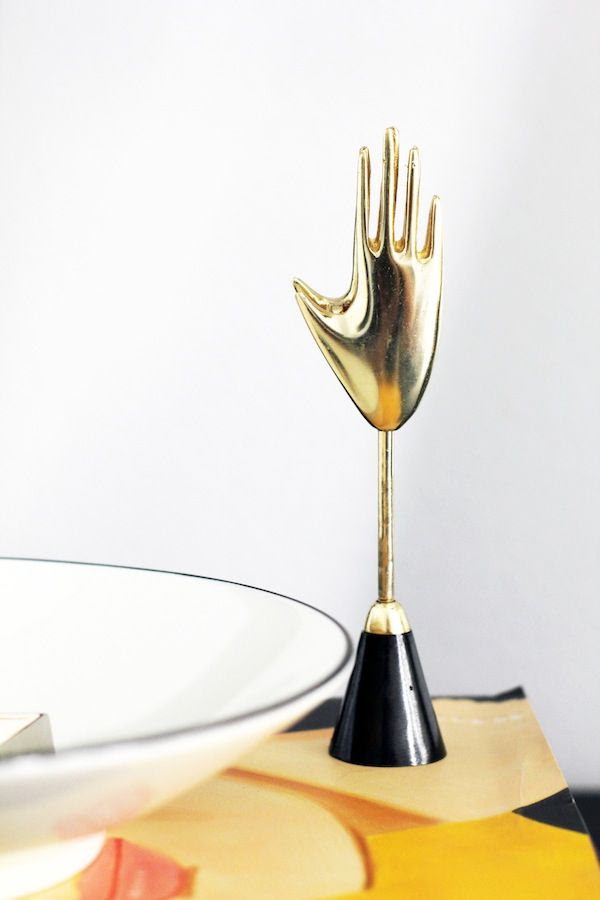 Le Fashion Blog Chic Stylish Entryway Urban Outfitter Brass Hand Clip Alex Katz Book Crate Barrel Catch All Bowl Jenn Camp For Simon Said