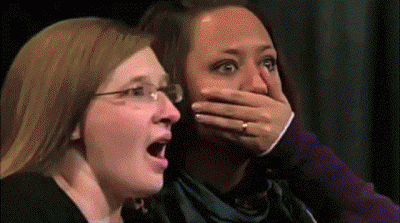 talk show audience flipping out GIF