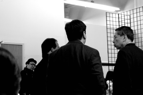 Consuls in a huddle