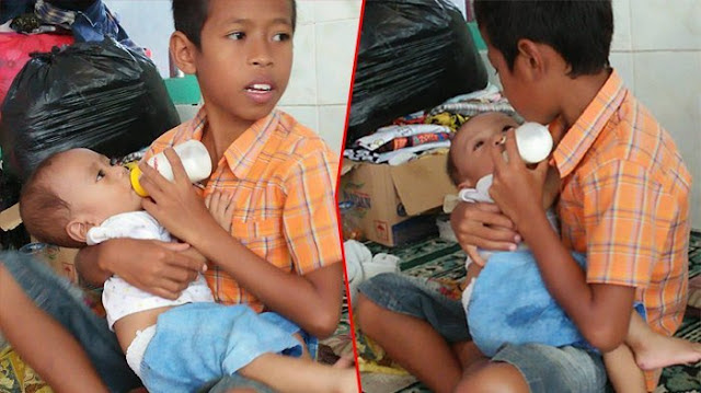 Kasihan! Rumahnya Tersapu Banjir Bandang, Foto Bocah Pengungsi Susui Adiknya Ini Bikin Sedih, Doakan Semoga Sehat Slalu, AMIN..! http://ift.tt/20kt43r - Berita Terkini Terbaru Hari Ini - Bencana hebat melanda Bima, Nusa Tenggara Barat (NTB) di penghujung tahun 2016. Peristiwa banjir bandang tersebut terjadi pada Rabu (21/12/2016) sore sekitar pukul 15.00 WITA. Lima kecamatan di Kota Bima yang terdampak banjir setinggi 1-2 meter.