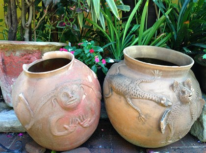 20140619hooaxaca0622Bsmag-1 Pottery on a patio of Las Golondrinas hotel in Oaxaca.