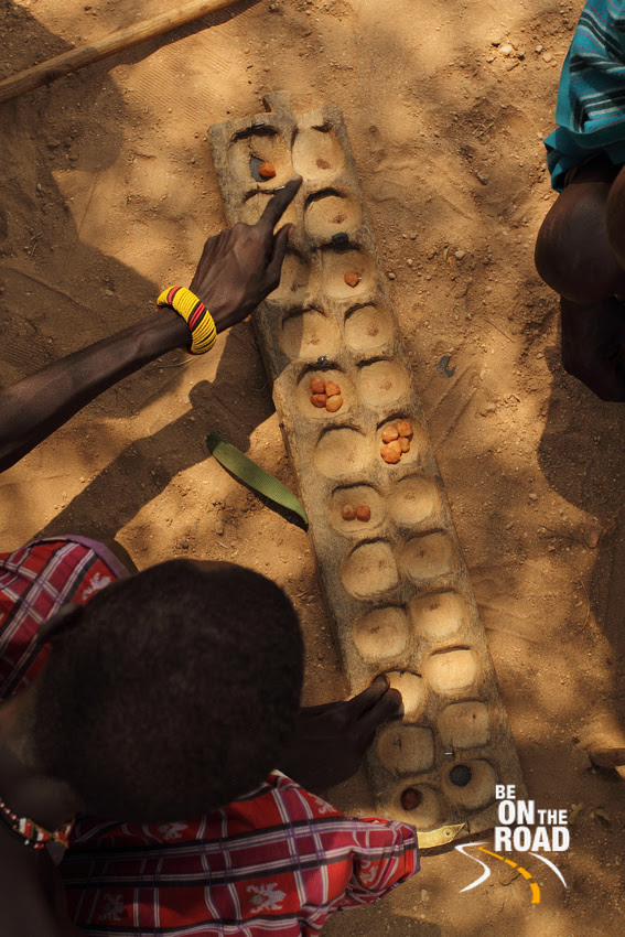 This game played with seeds and compartments is only played by the elderly men of the Samburu tribe