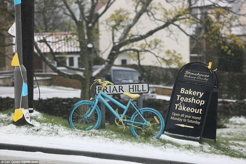 Roads in Castleton village in North Yorkshire are covered in snow as temperatures plummeted to about 0C [32F]