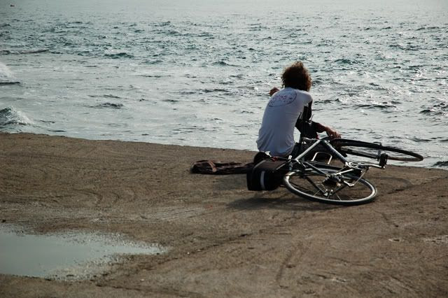 Boy with Bike Lost in Reflections