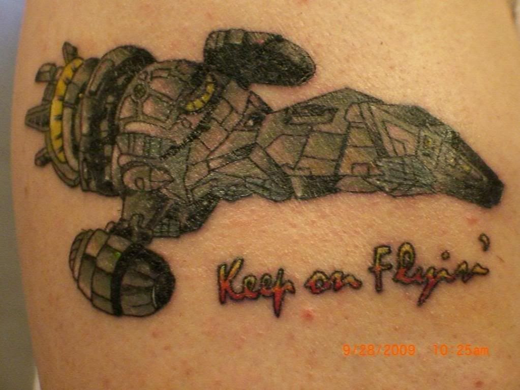 DARWIN54's tattoo is the best of the three I've seen. It is perfection.