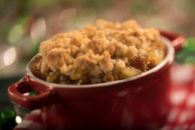 This perfect dish of Apple Cranberry Cobbler topped with sweet breadcrumb crumble and gooey icing.