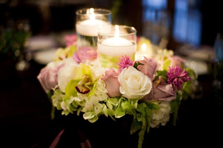 We alternated between 3 different centerpieces.  This one was a dark stained box packed with flowers and hurricane candles.