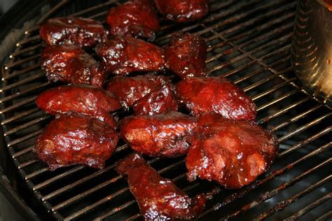 As friends start to trickle in, watch . SchweinebÃ¤ckchen vom Weber Smokey Mountain Cooker WSM