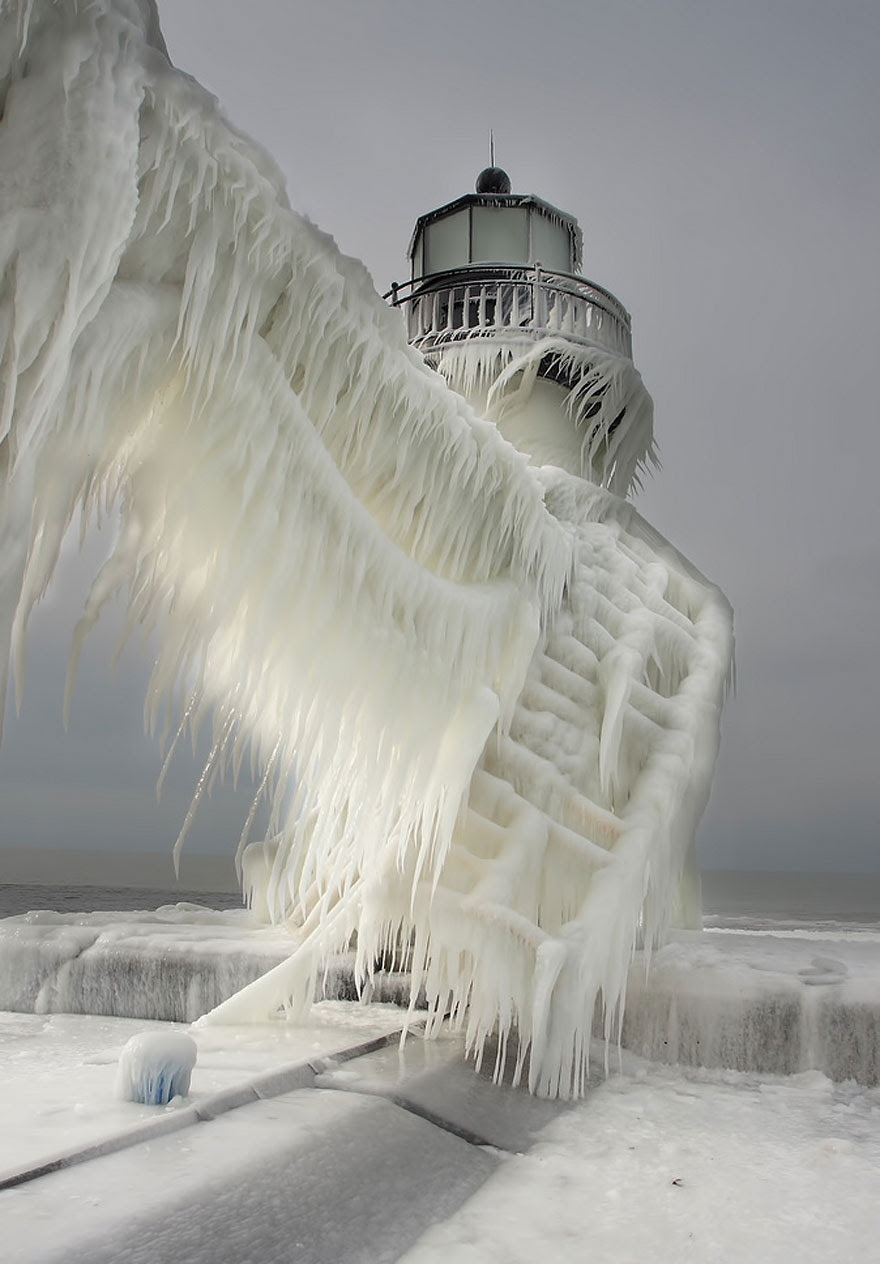 http://www.boredpanda.com/flozen-lighthouses-on-lake-michigan-shore/