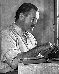 Hemingway posing for a dust jacket photo by Ll...