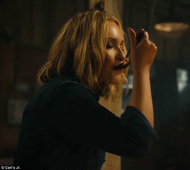 Try before you buy: She tastes the sauce before the shot cuts to the meat cooking