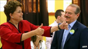 Dilma Rousseff (l) and candidate to Governor of Rio Grande do Sul state, Tarso Genro, after voting in Porto Alegre, Brazil, 31 October 2010