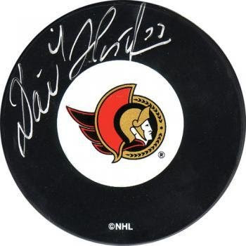 Dominik Hasek Autographed Puck (Ott) - Autographed NHL Pucks