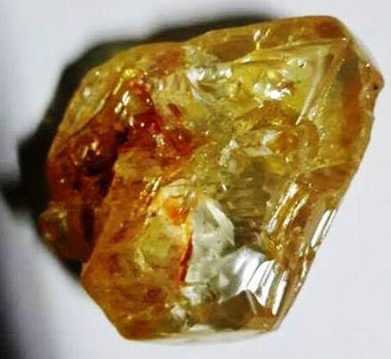 An undated picture released March 16, 2017 of a 706-carat diamond discovered by pastor Emmanuel Momoh in eastern Sierra Leone. Sierra Leone State House/Handout via Reuters