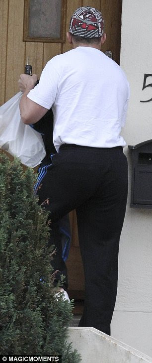 On good terms again: The cagefigther was seen arriving at their home with food and he stayed for a few hours suggesting Chantelle, pictured on Friday, are at least still speaking