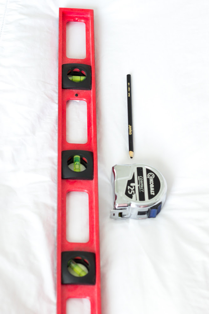 How to Shiplap a Wall for Free | Bless'er House for Remodelaholic.com - A quick and easy tutorial on how to shiplap a wall for free using just two standard toolbox items. No hard labor, no damage, and no commitment needed.