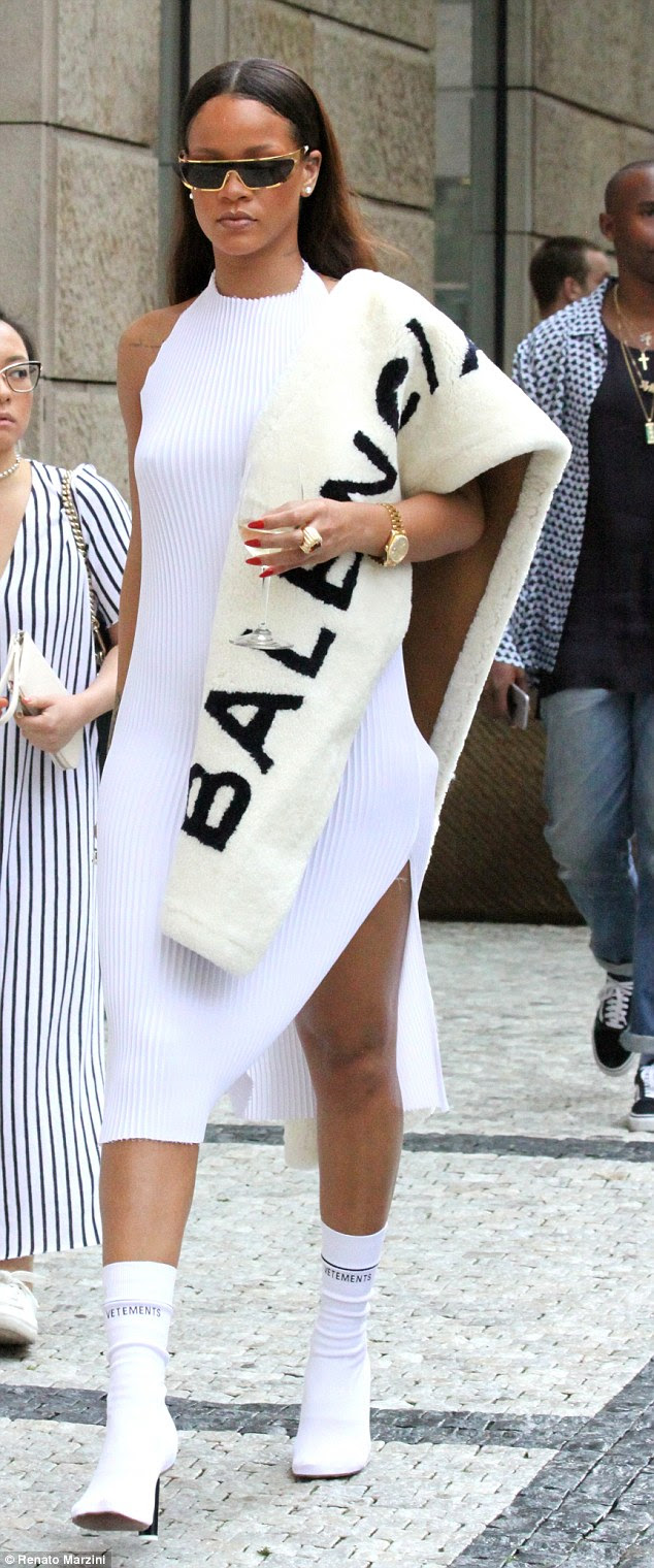 Glamour girl: Rihanna, 28, opted for a luxurious ensemble when she stepped out in Prague on Wednesday after performing in the Czech capital