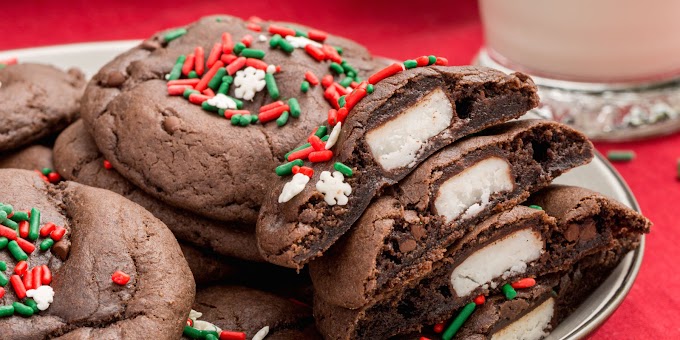 Types Of Cookies For Christmas - 25 of the Most Festive Looking Christmas Cookies Ever - Although they may appear challenging to make, all that's required is rolling two dough rectangles of different colors together in a pinwheel.