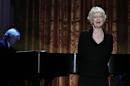 FILE - In this July 19, 2010 file photo shows actress Elaine Stritch performing at a White House Music Series event saluting Broadway in the East Room of the White House in Washington. Stritch died Thursday, July 17, 2014 at her home in Birmingham, Mich. She was 89. (AP Photo/Carolyn Kaster, File)